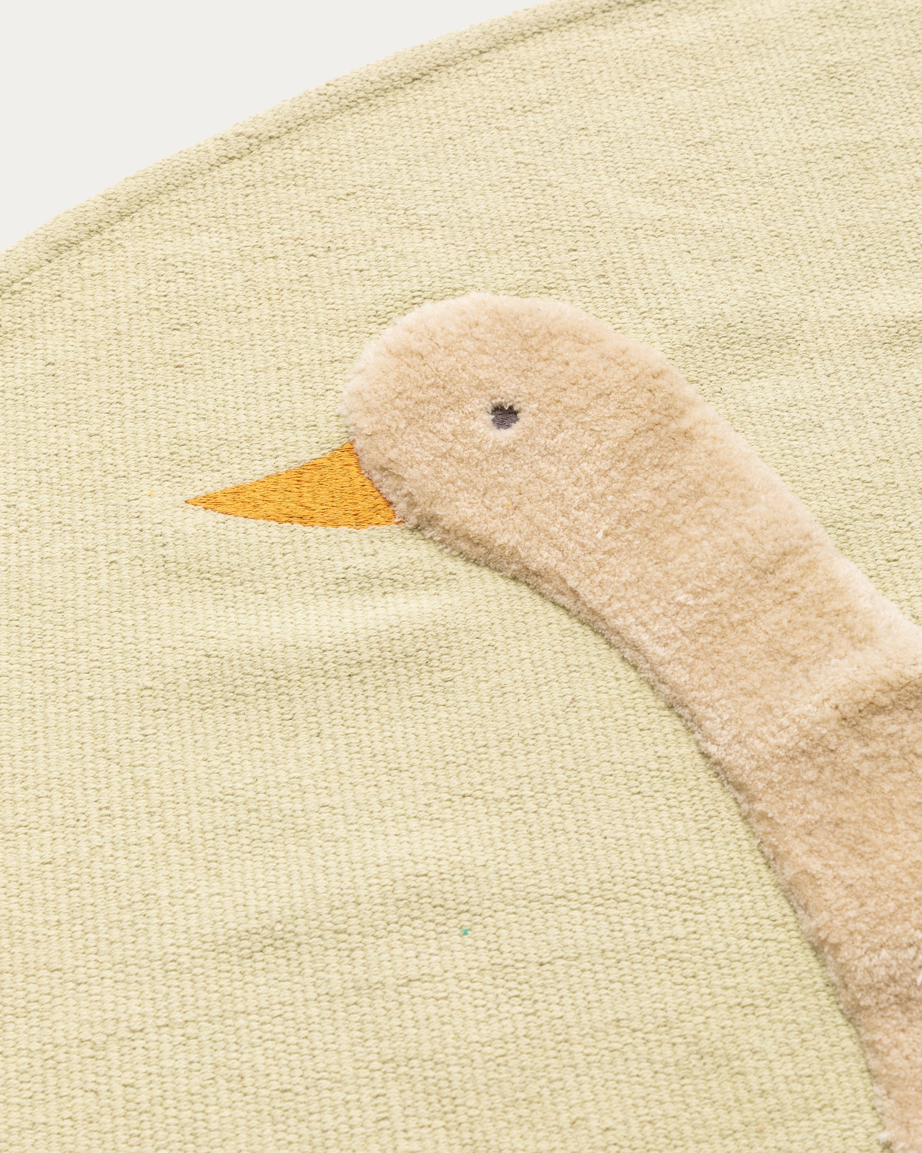 Milu green, 100% cotton rug with a goose feature, Ø 100 cm - Detail
