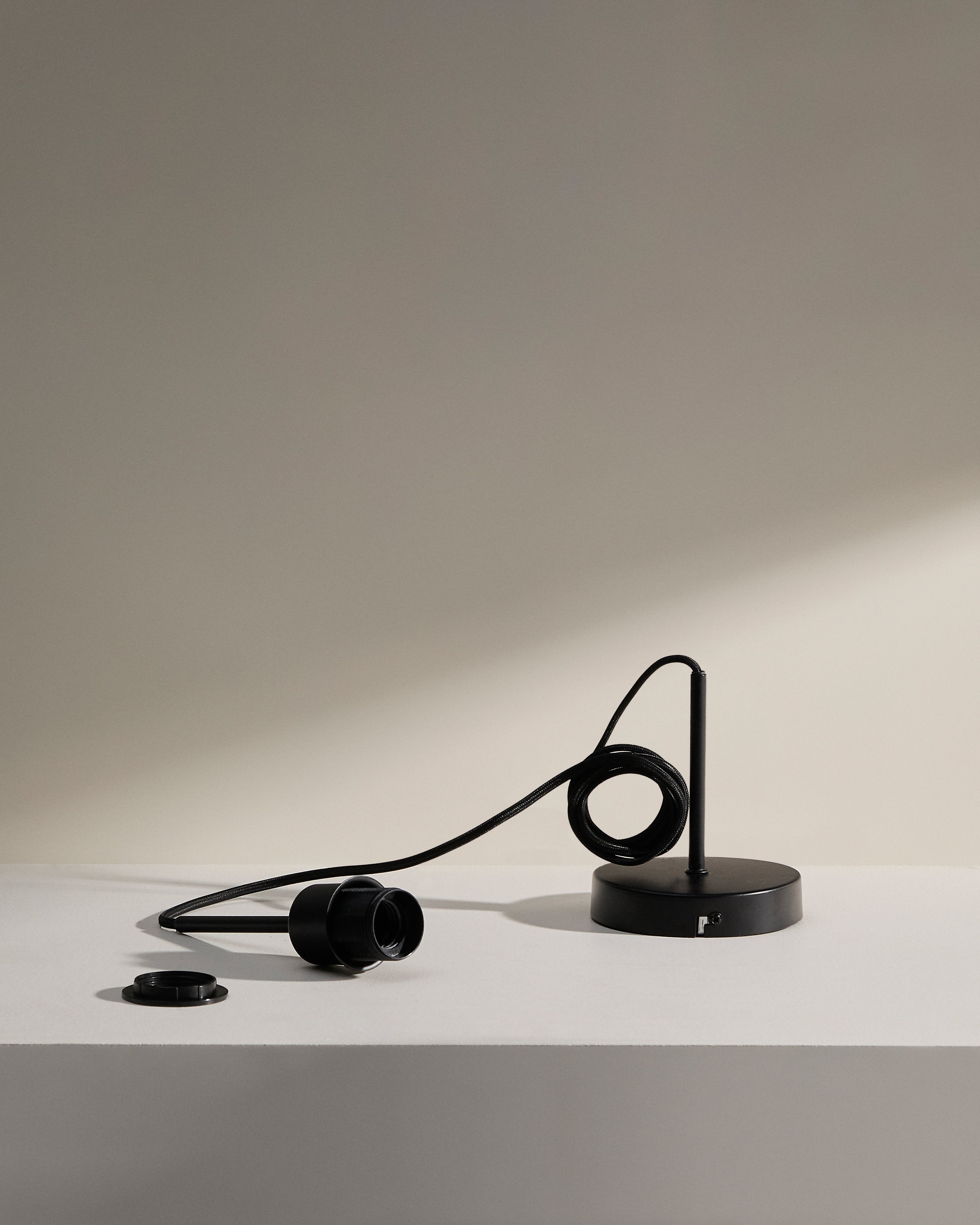 Fluvia metal lamp fittings in a black finish, 250 cm - Product Image