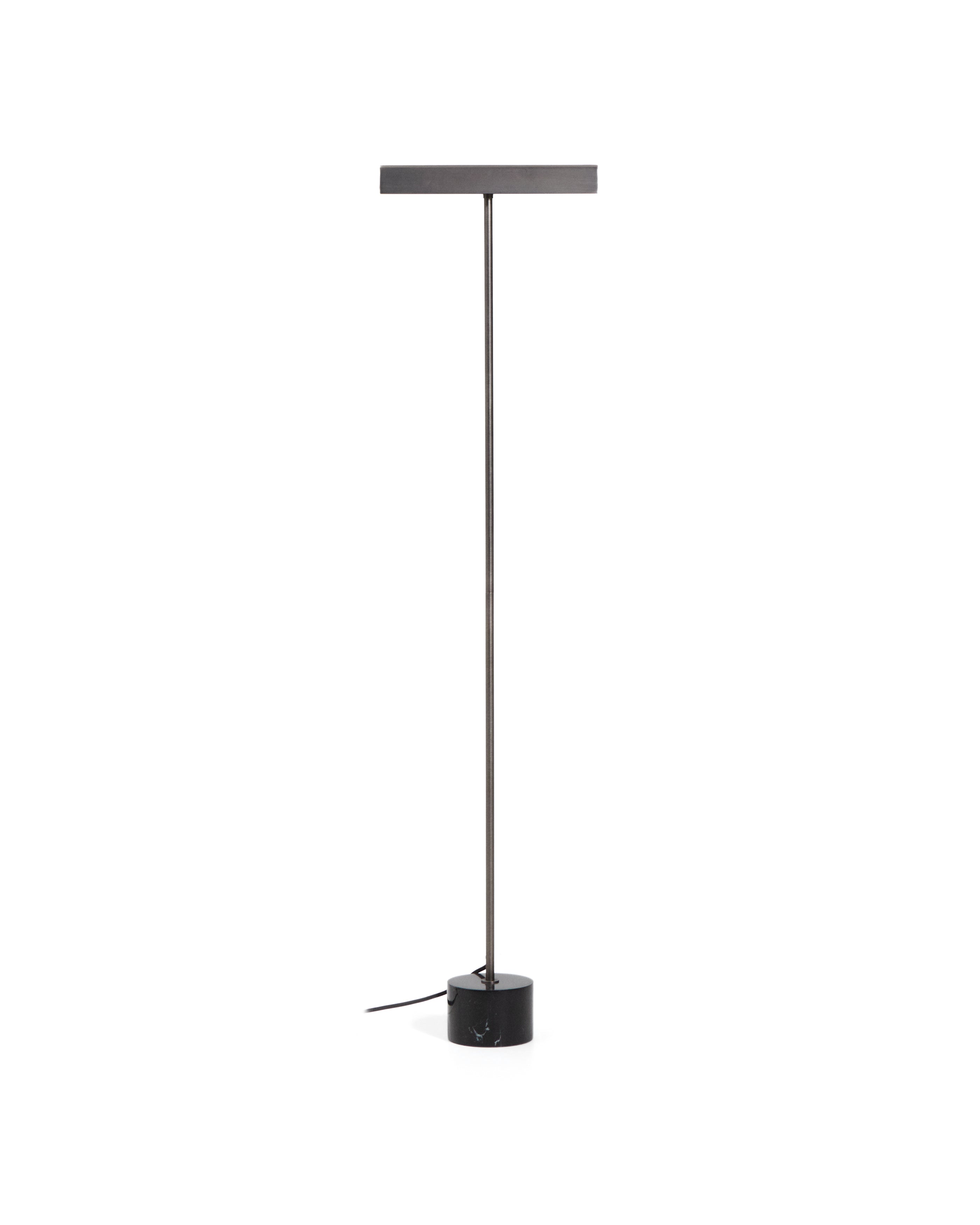Lynor brushed metal floor lamp with black marble base - Product Image