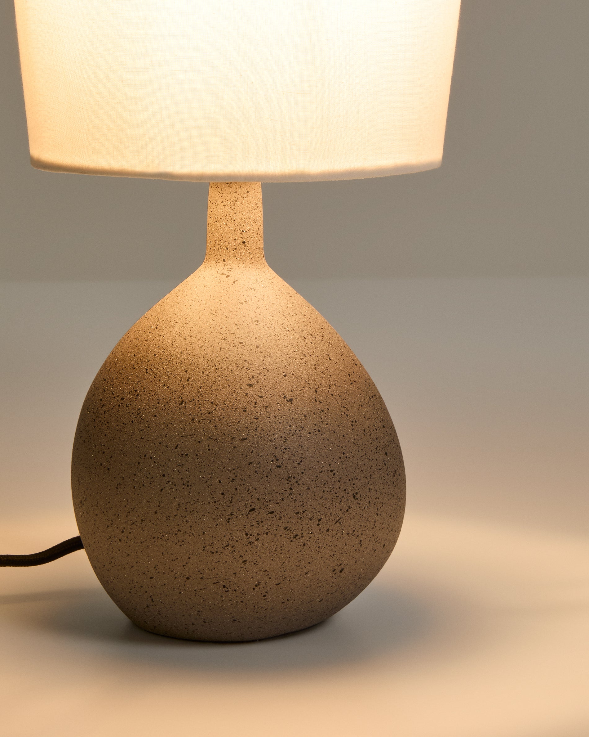 Viona large table lamp with textured stone effect and cotton lampshade - Detail