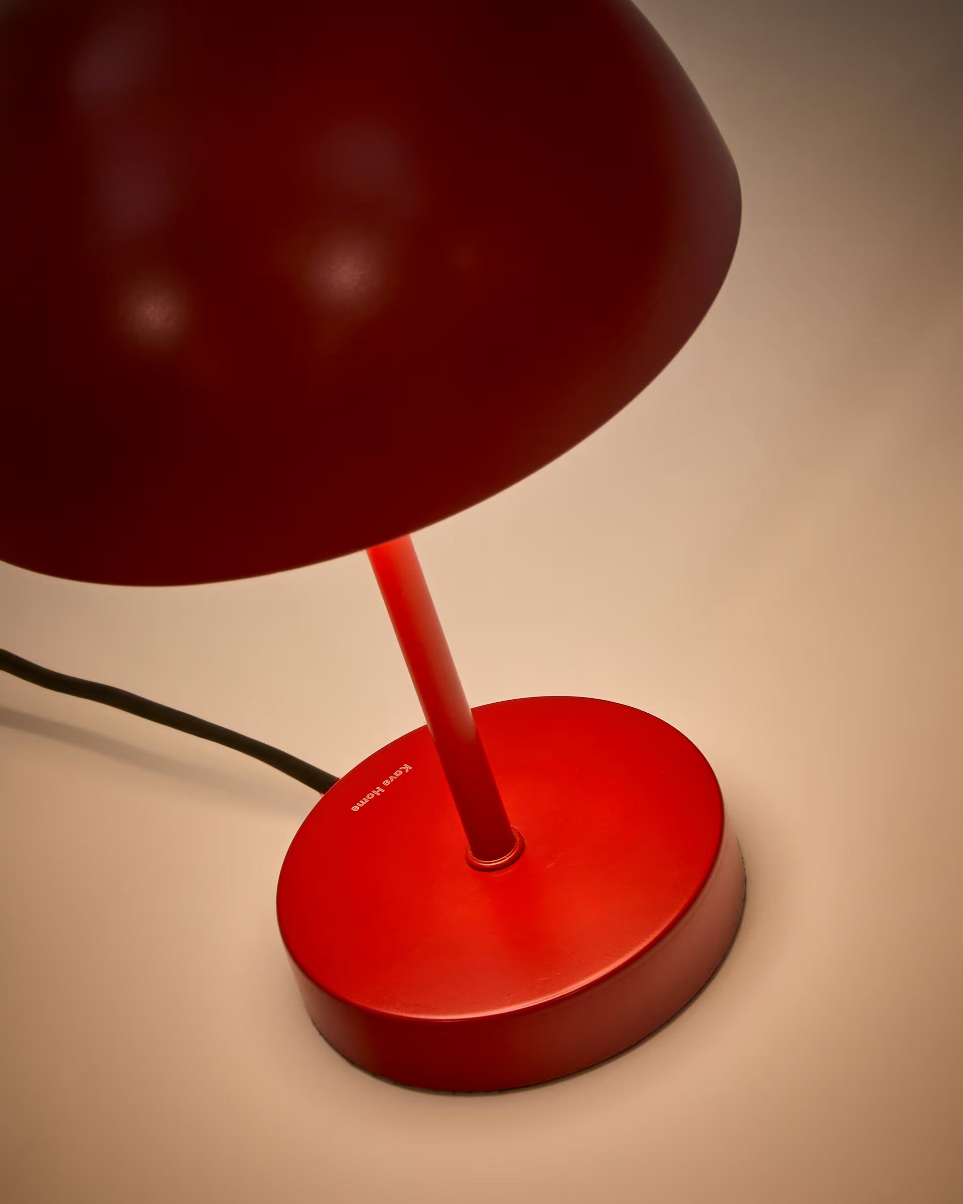 Oronja metal table lamp in red painted design.