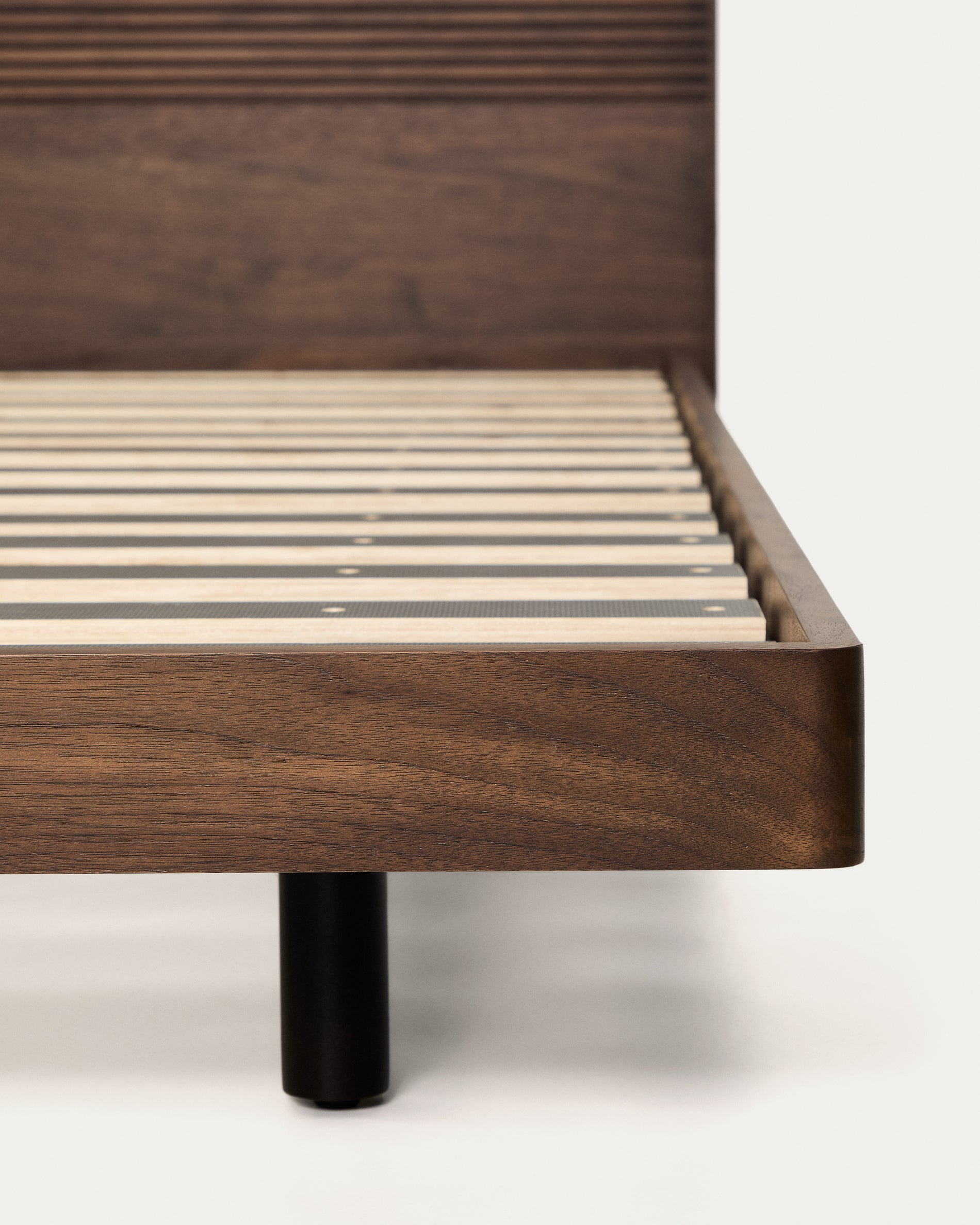 Norlen bed in walnut veneer with dark finish and LED light for 160 x 200cm mattress FSC Mix Credit - Detail