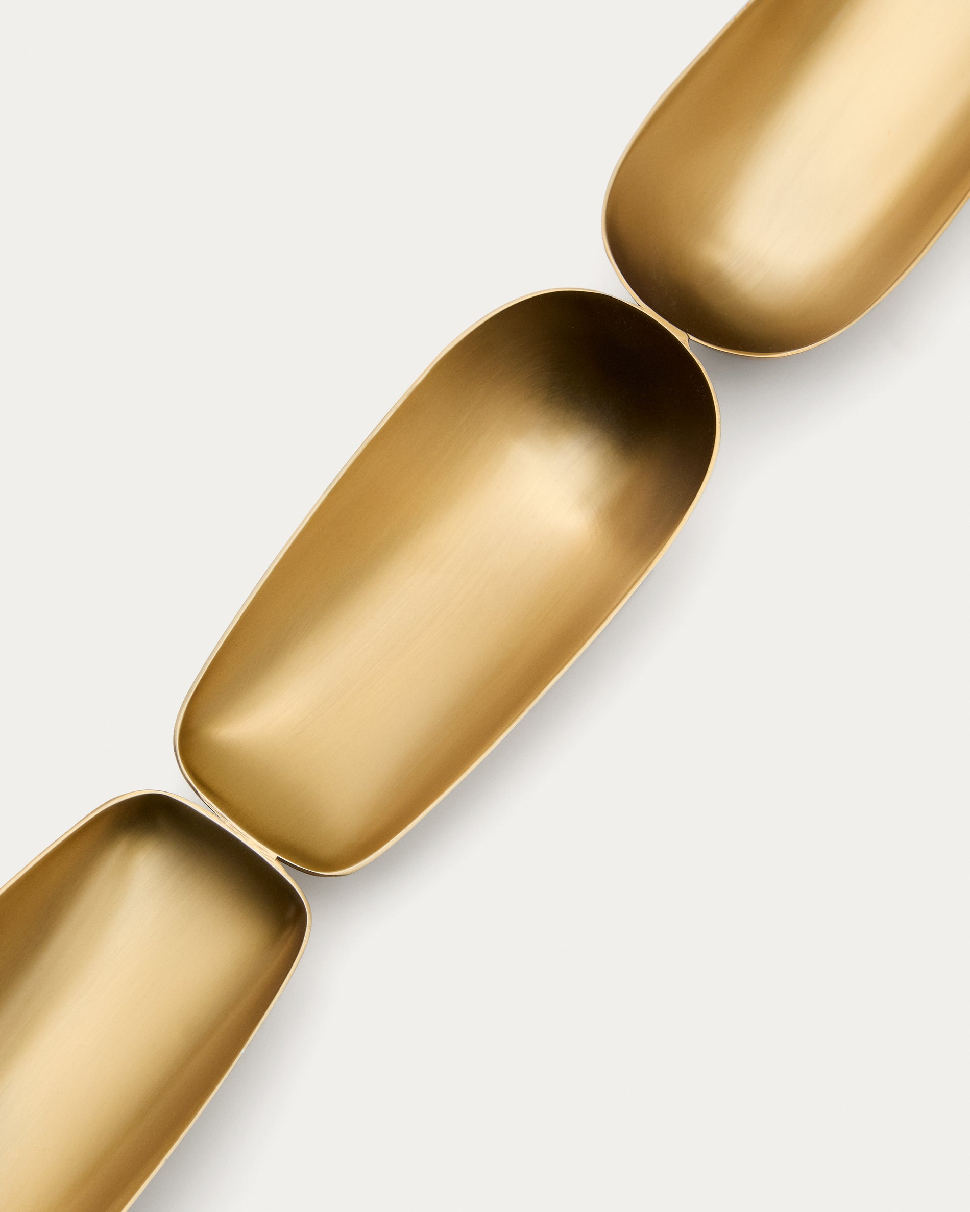 Aruc 4 plates made of gold-coloured stainless steel - Detail