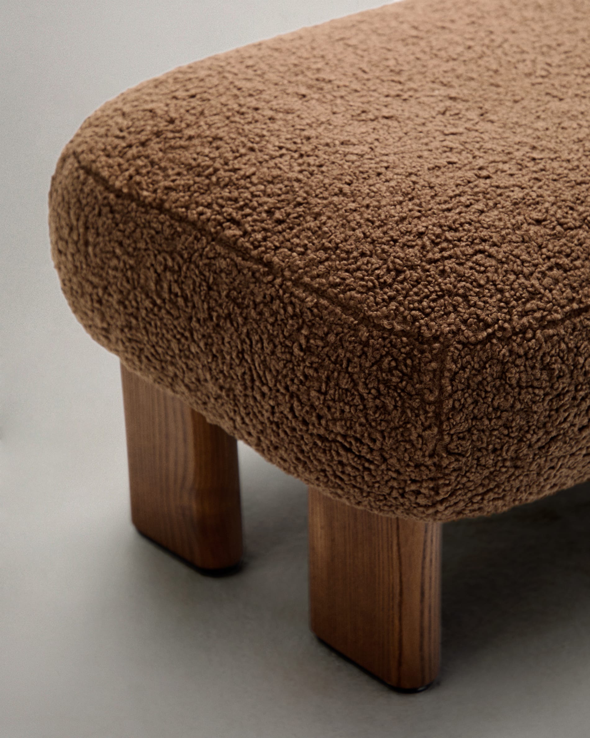 Cabana ocher bouclé pouf with solid ash wood legs, walnut finish, 65x55.4cm, FSC 100%