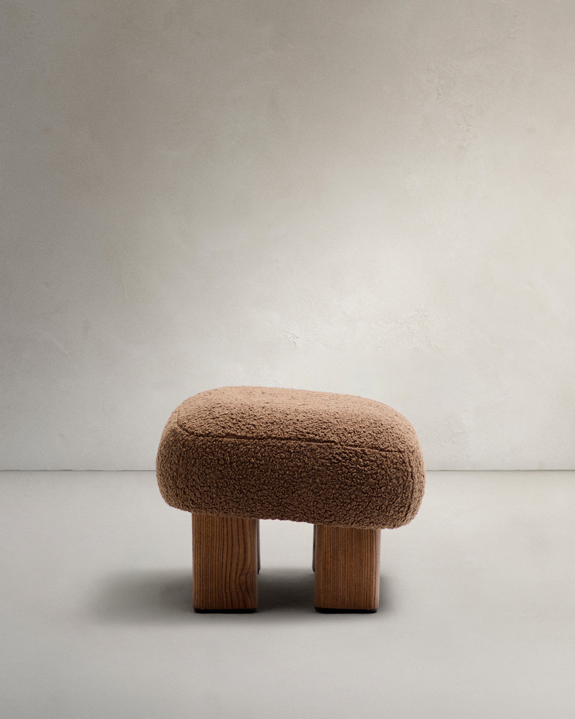 Cabana ocher bouclé pouf with solid ash wood legs, walnut finish, 65x55.4cm, FSC 100%