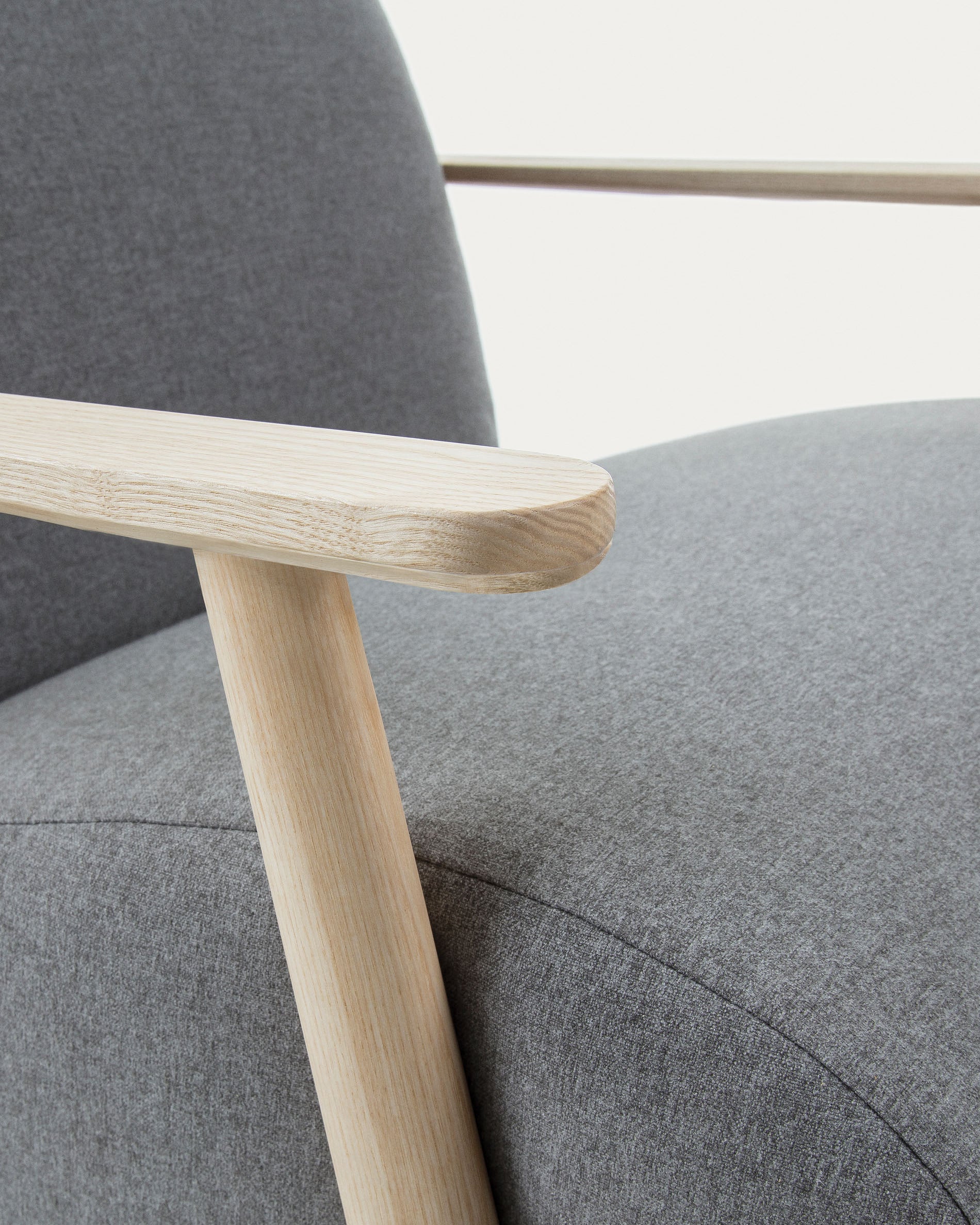 Meghan armchair in grey with solid ash legs with natural finish - Detail