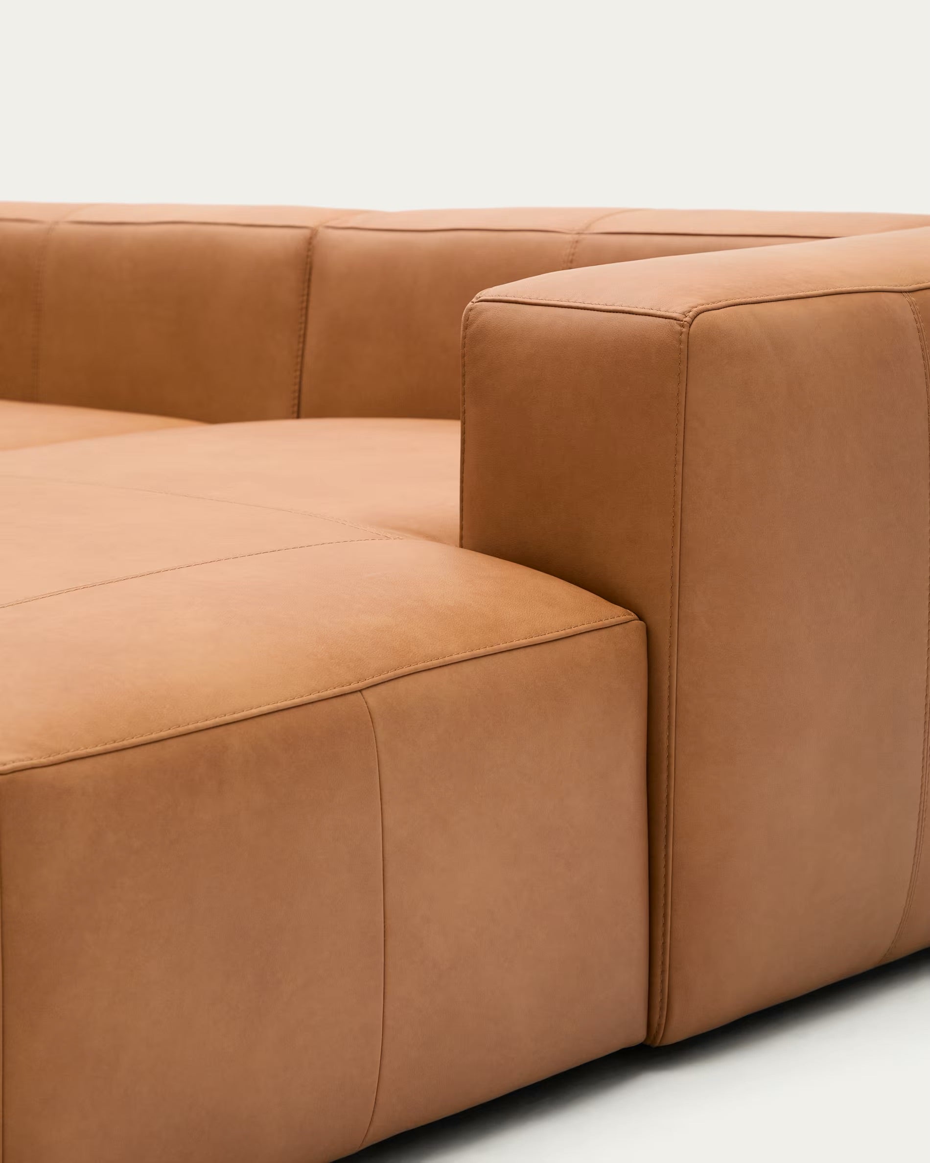 Blok brown leather 3-seater sofa with chaise longue section on the left, 300 cm.