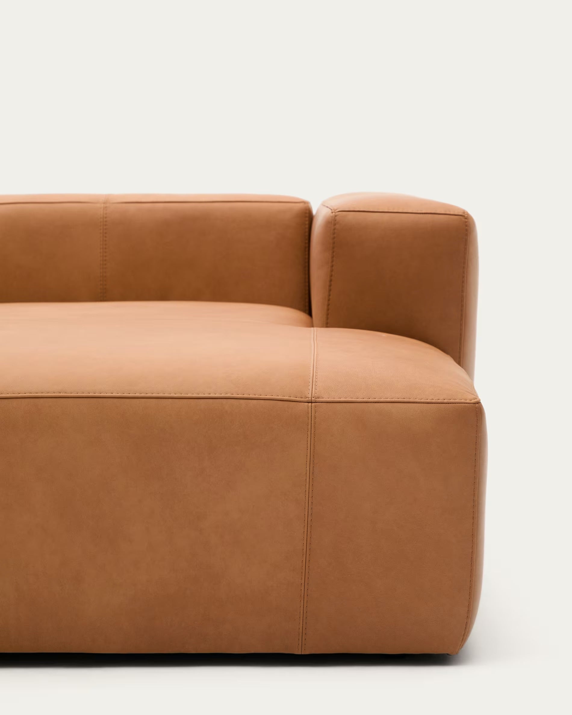 Blok brown leather 3-seater sofa with chaise longue section on the left, 300 cm.