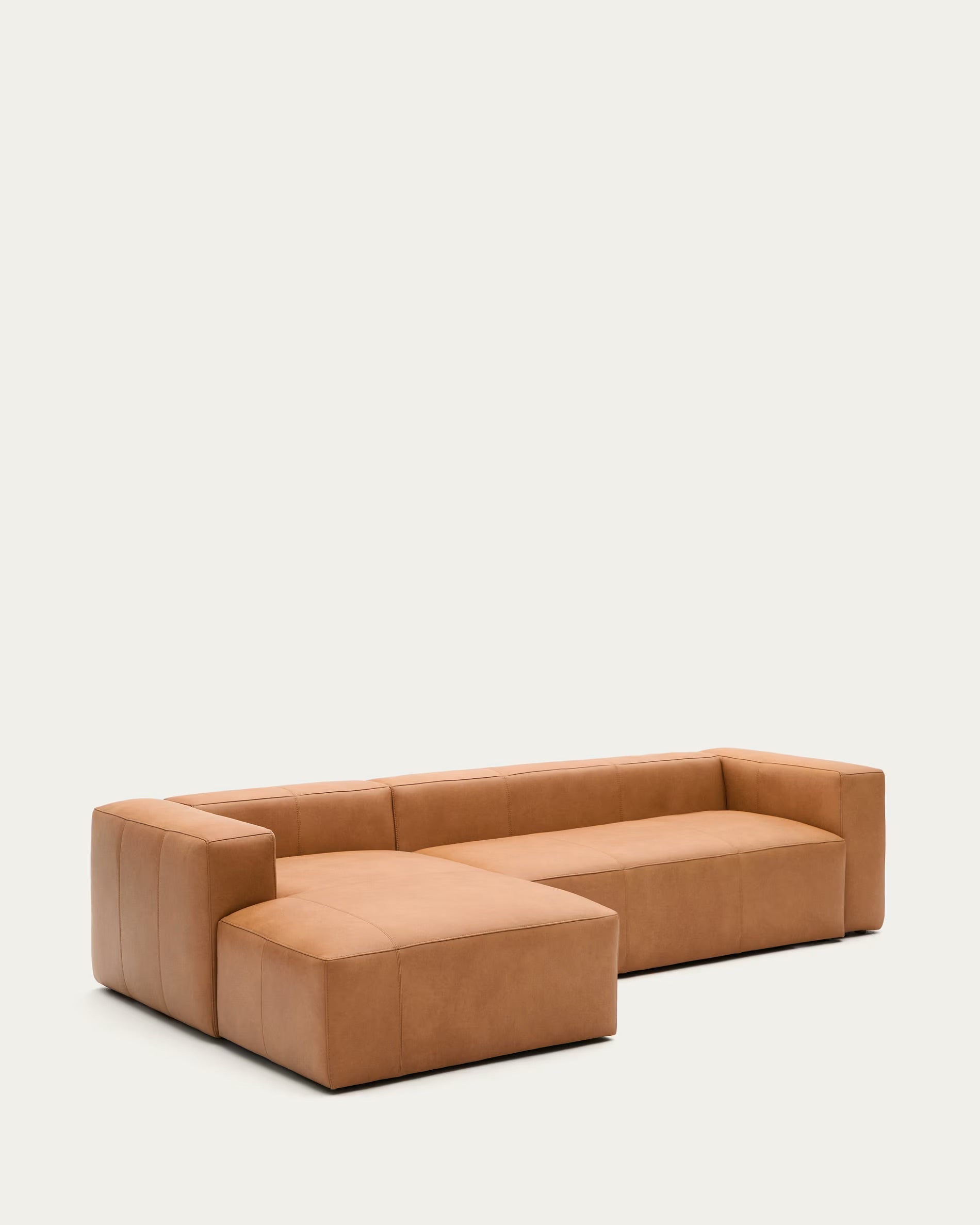 Blok brown leather 3-seater sofa with chaise longue section on the left, 300 cm.