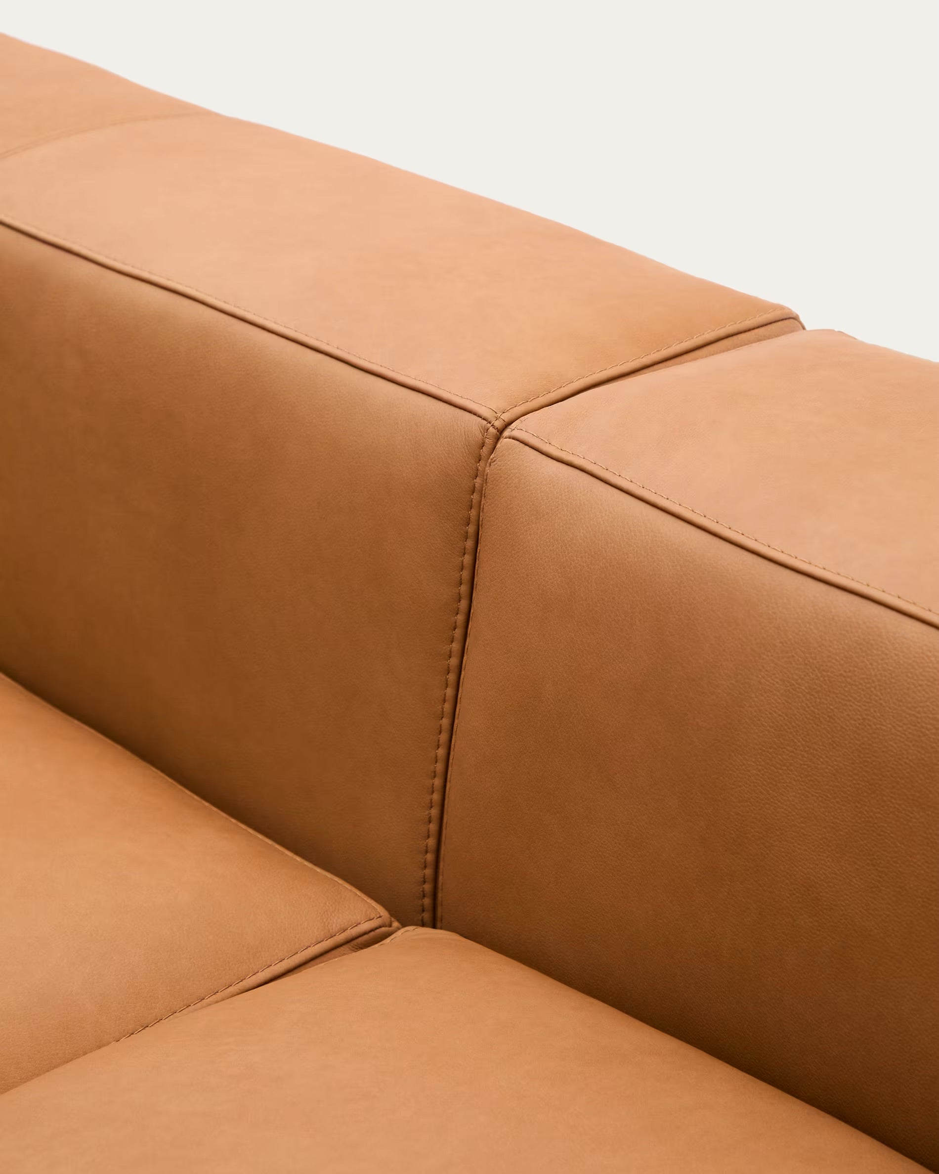 Blok brown leather 3-seater sofa with chaise longue section on the right, 300 cm.