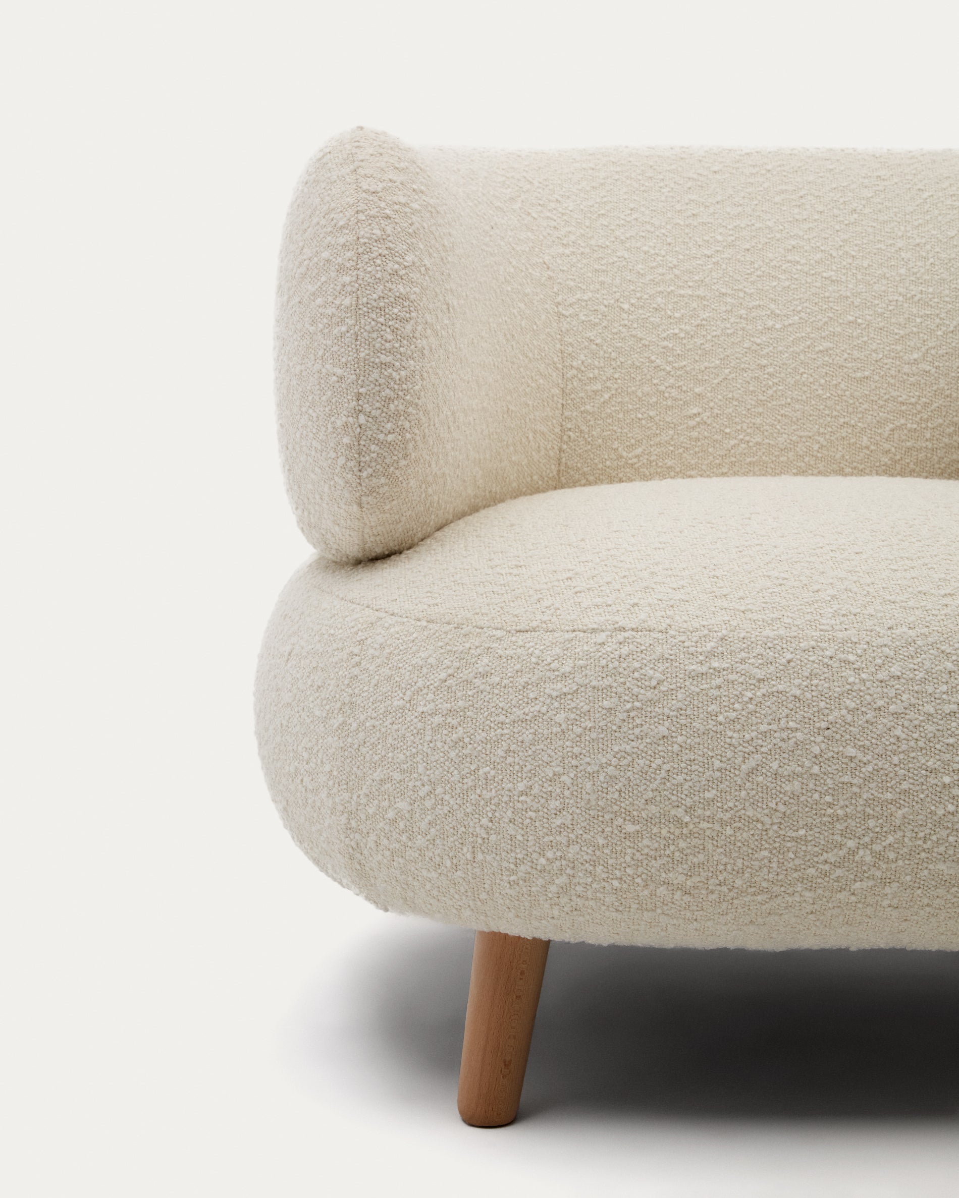 Luisa armchair in white bouclé with solid beech legs