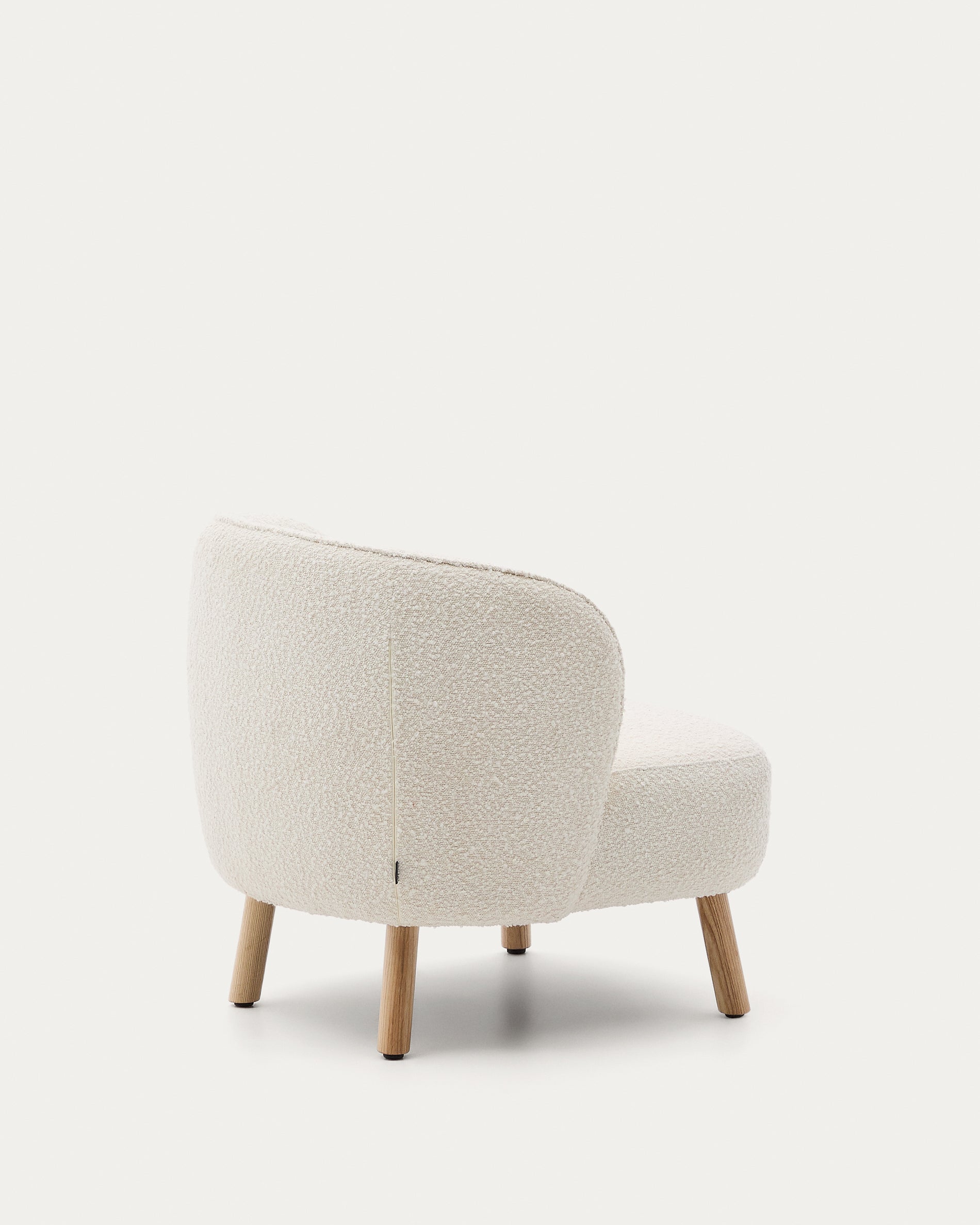 Ulit armchair in white bouclé with solid beech wood legs in a natural finish - Product View