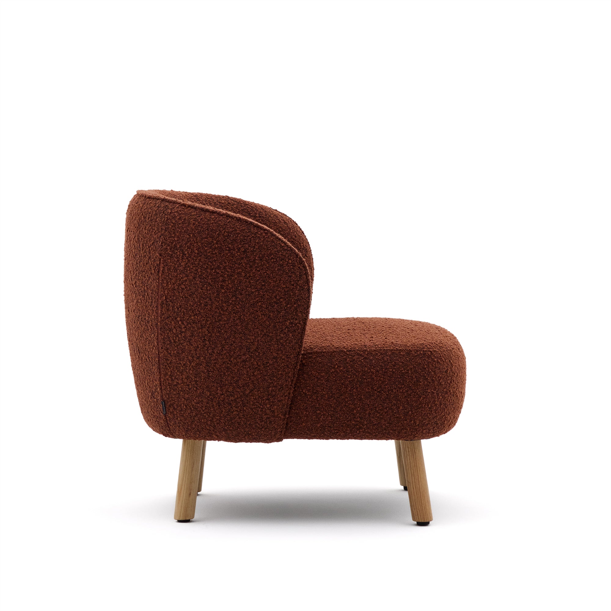 Ulit armchair in terracotta bouclé with solid beech wood legs in a natural finish - Product Image