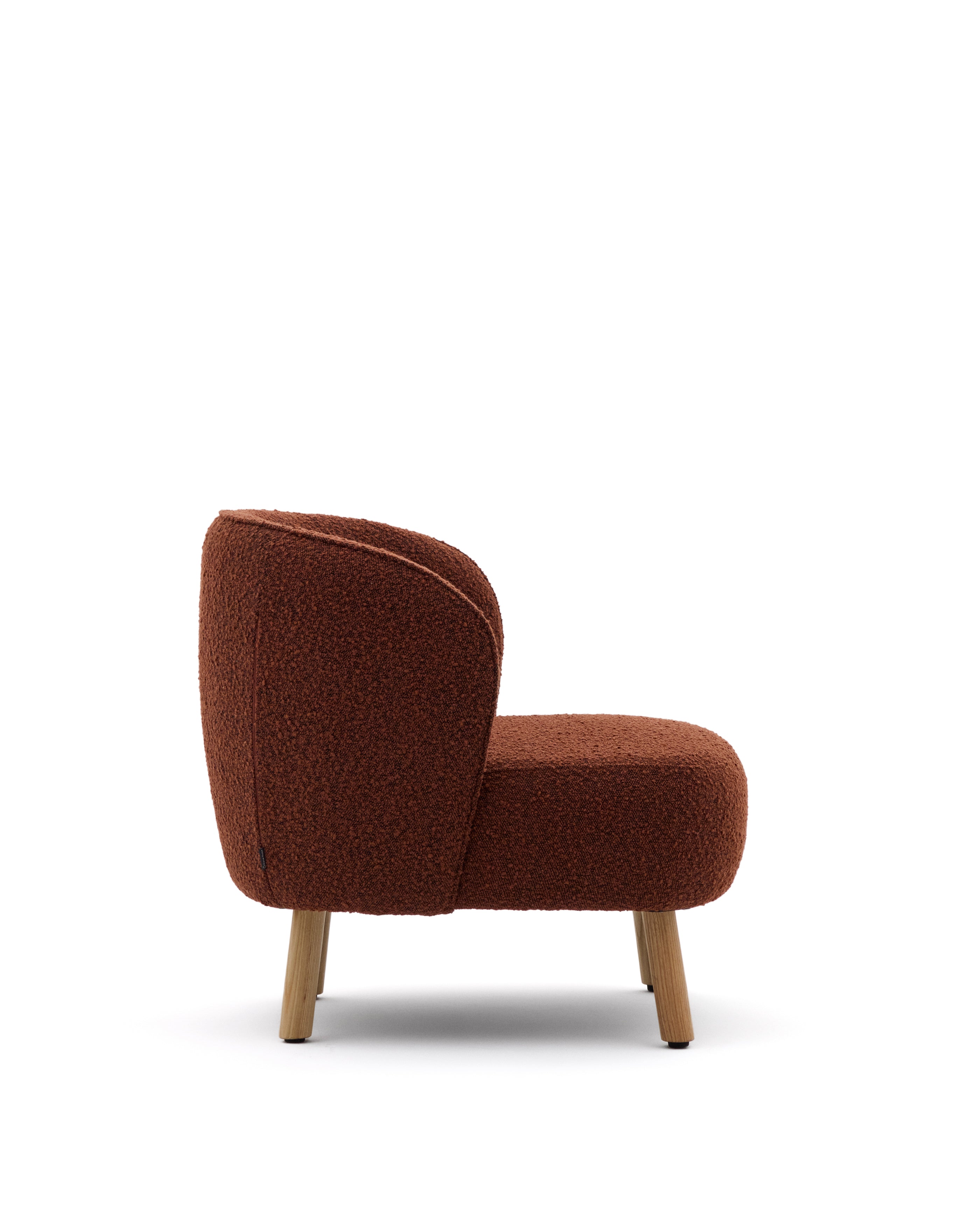 Ulit armchair in terracotta bouclé with solid beech wood legs in a natural finish - Product Image