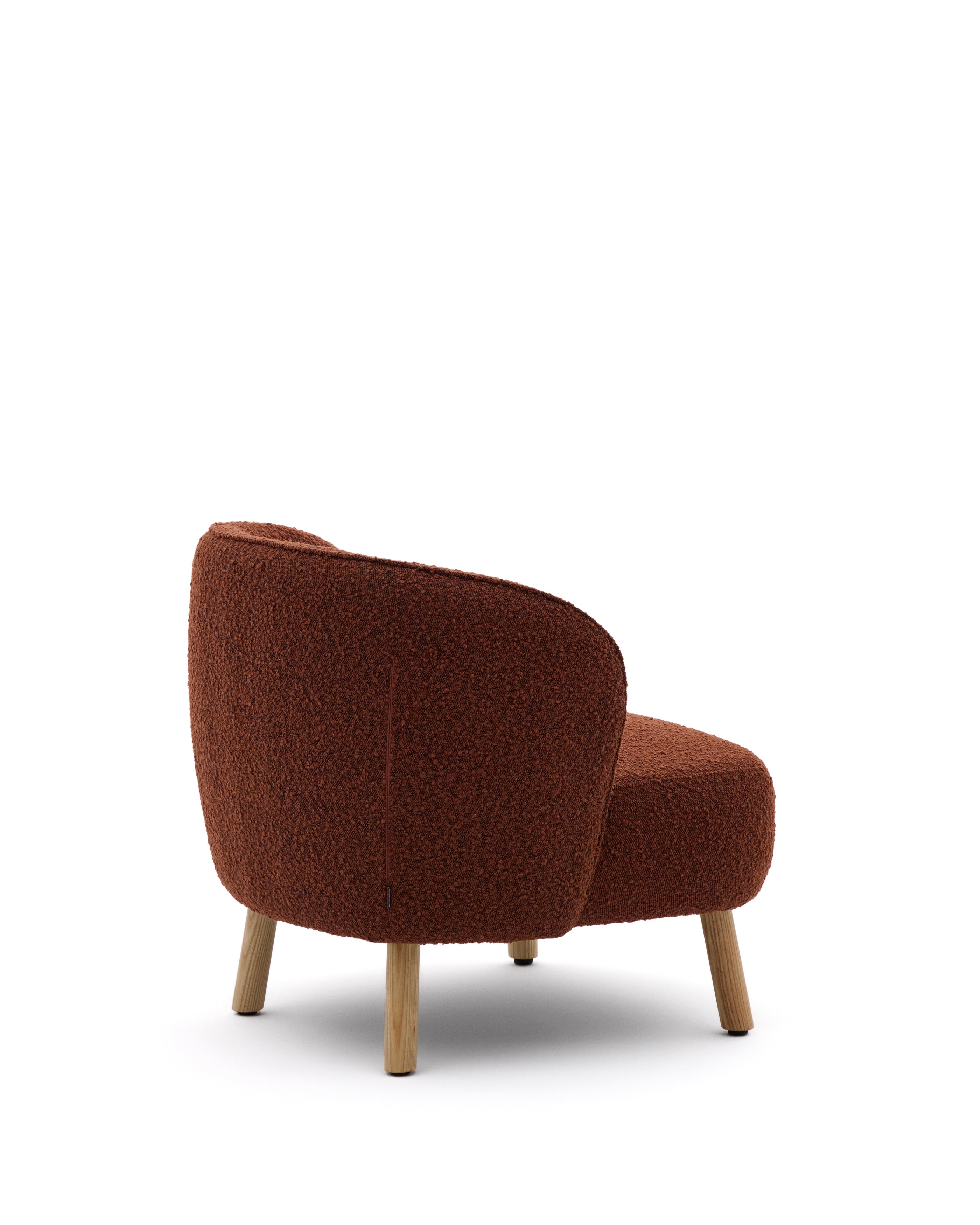 Ulit armchair in terracotta bouclé with solid beech wood legs in a natural finish - Product Image