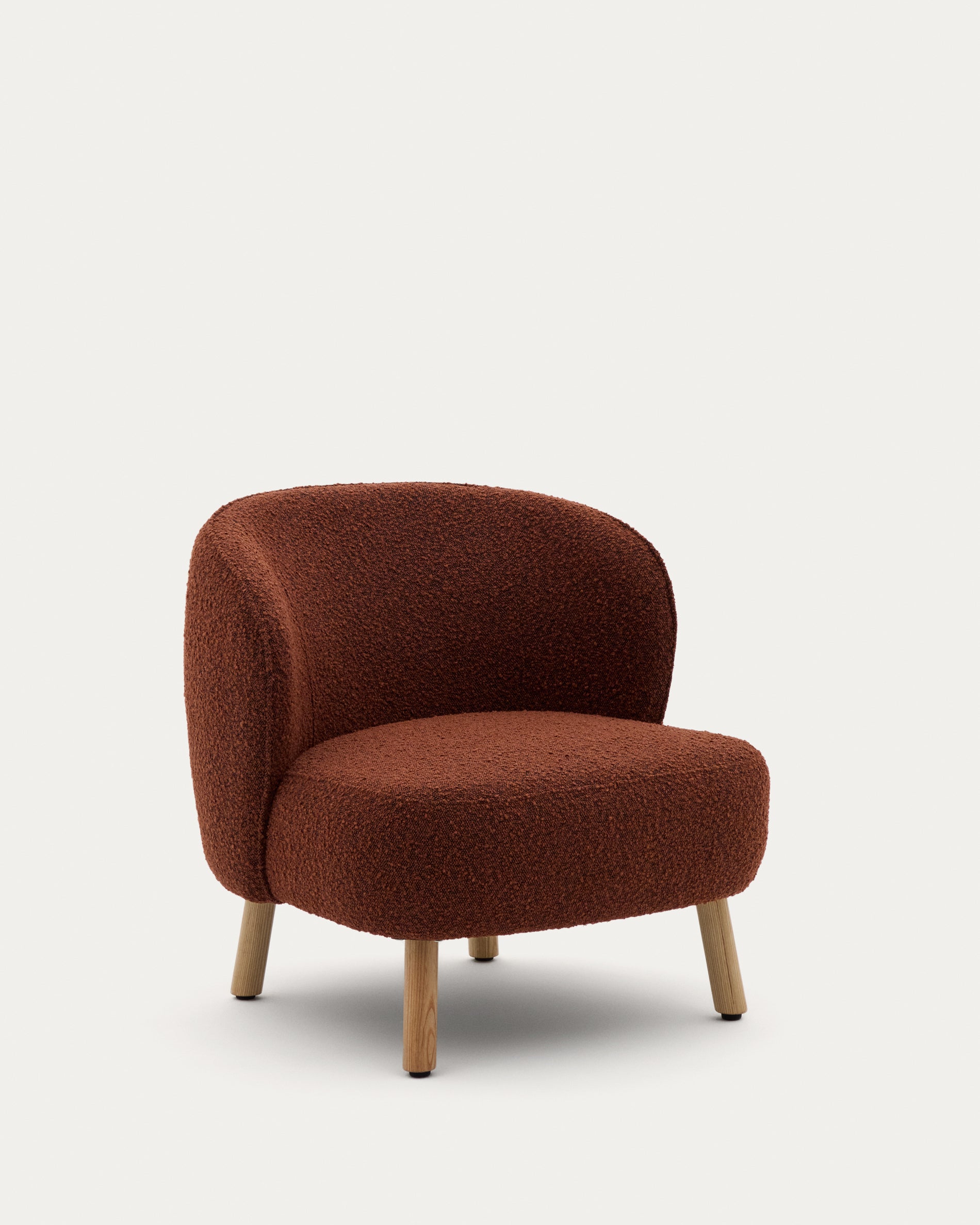 Ulit armchair in terracotta bouclé with solid beech wood legs in a natural finish - Product View