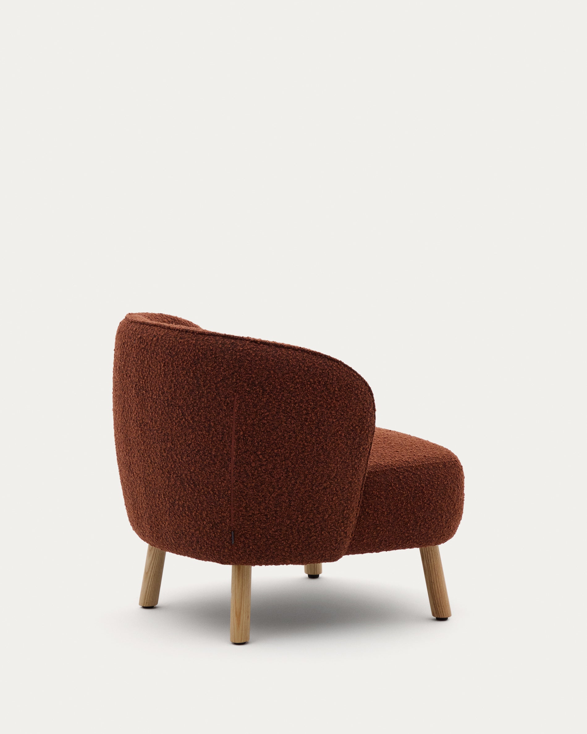 Ulit armchair in terracotta bouclé with solid beech wood legs in a natural finish - Product View
