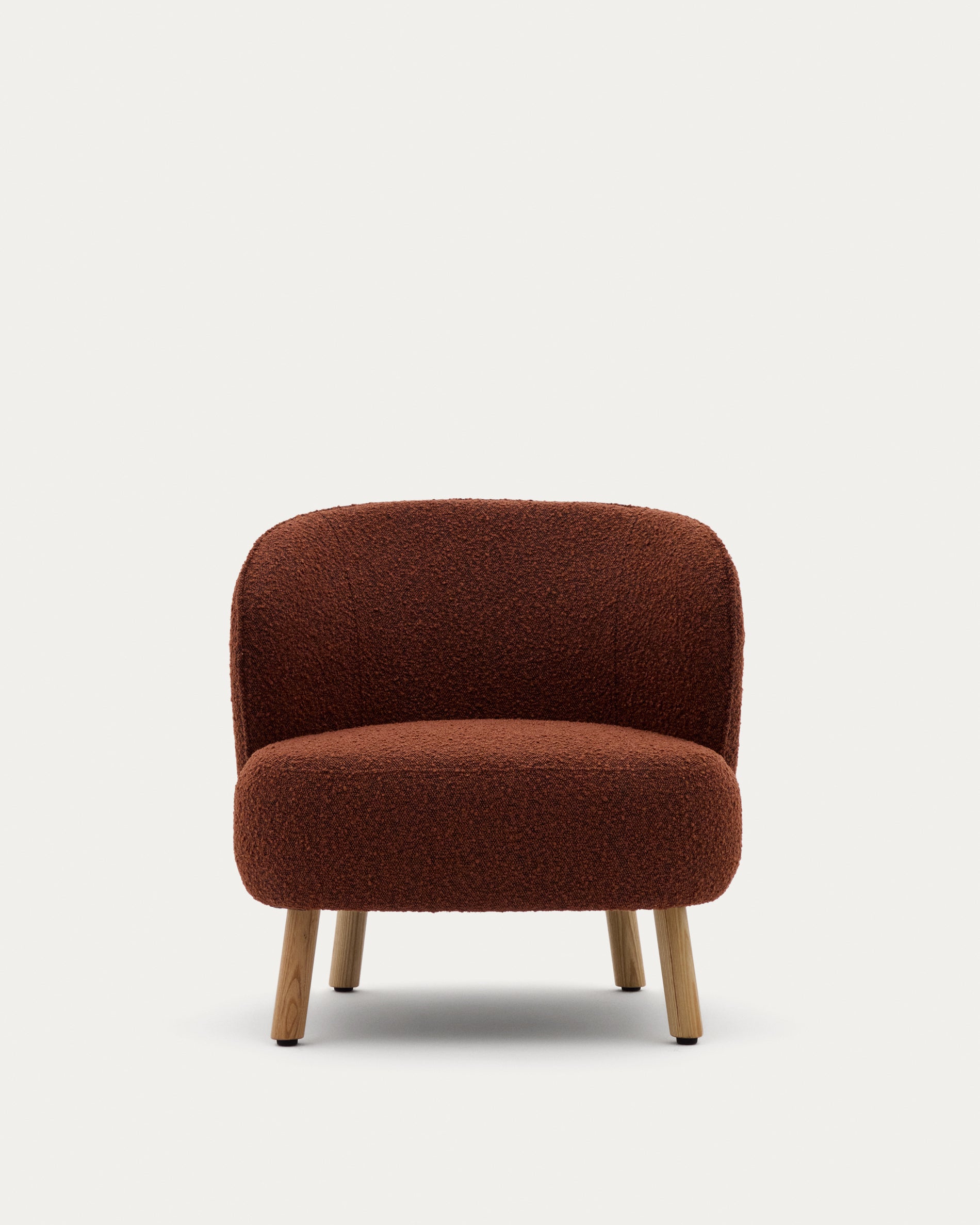 Ulit armchair in terracotta bouclé with solid beech wood legs in a natural finish - Product View