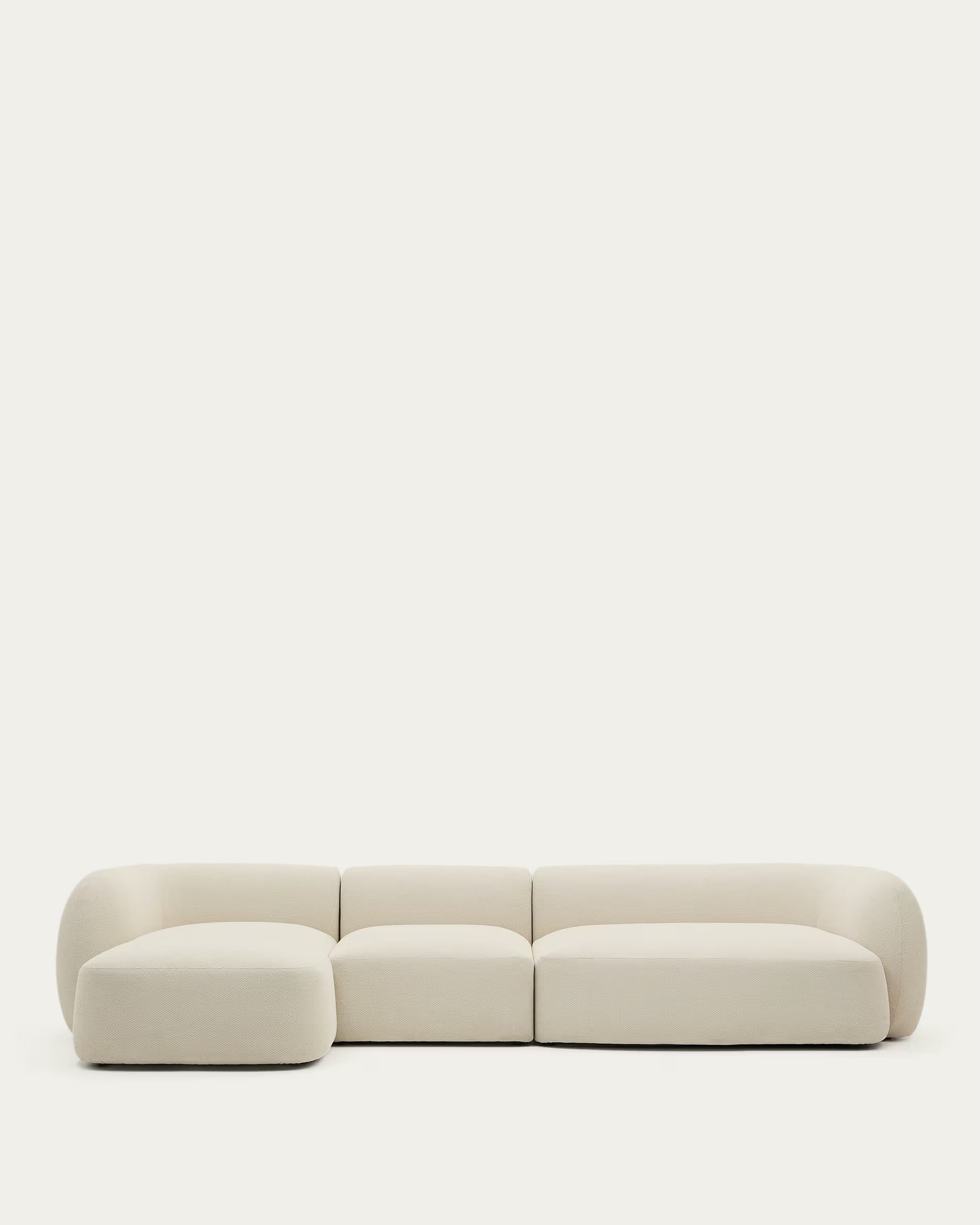 Ekrü-colored, modular, 4-seater Martina sofa with chaise longue section on the left, 377 cm.