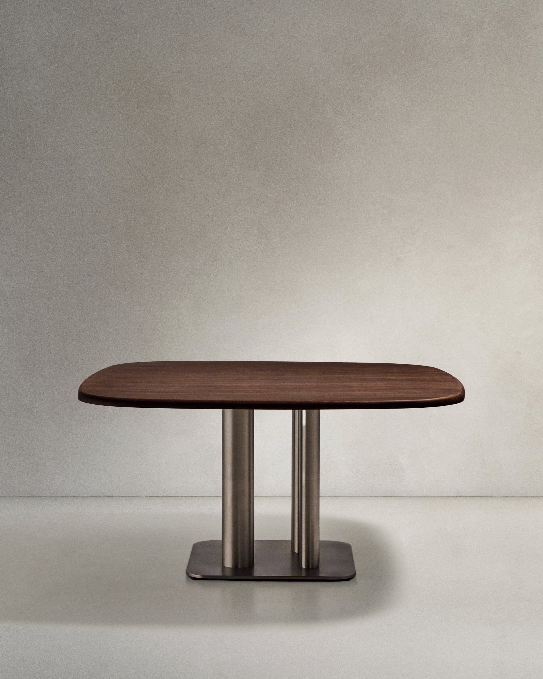 Melvar table made from walnut veneer and legs with brushed stainless steel base 150 x 150cm - Product View
