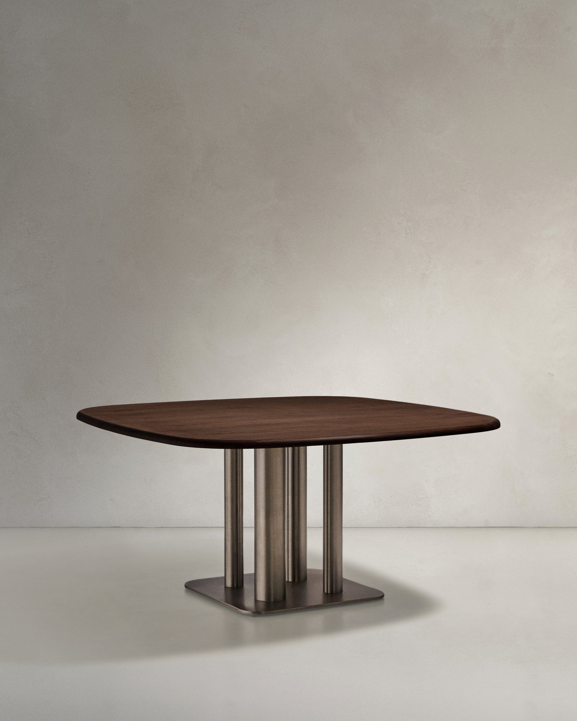 Melvar table made from walnut veneer and legs with brushed stainless steel base 150 x 150cm - Product View