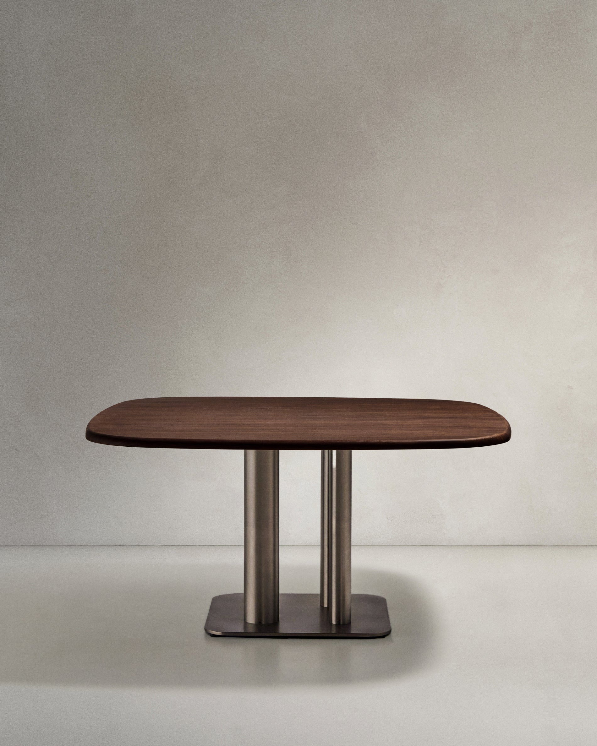 Melvar table made from walnut veneer and legs with brushed stainless steel base 121 x 121cm - Product View