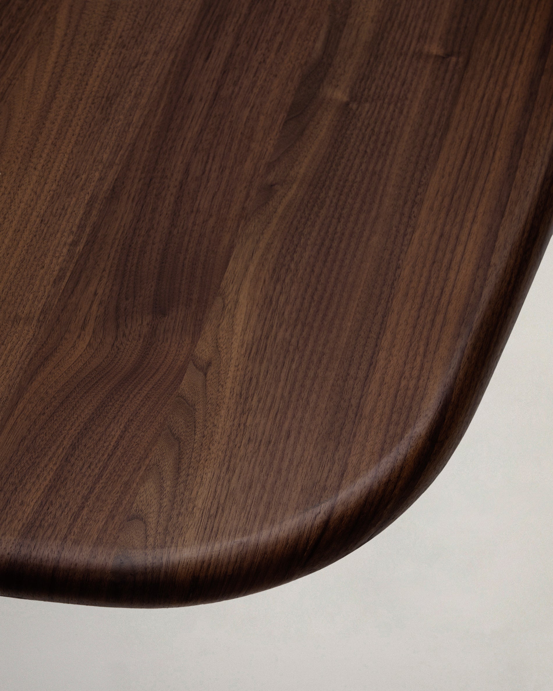 Melvar table made from walnut veneer and legs with brushed stainless steel base 180 x 100cm - Detail