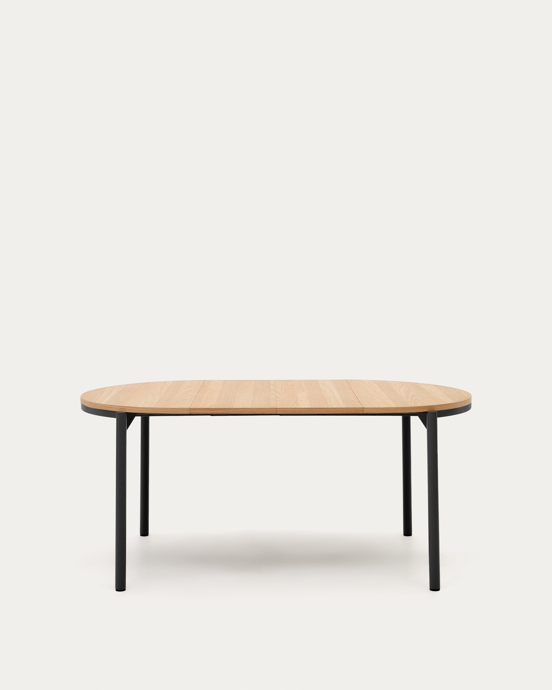 Montuiri round extendable table with oak veneer and black finished steel legs, Ø90(130) cm