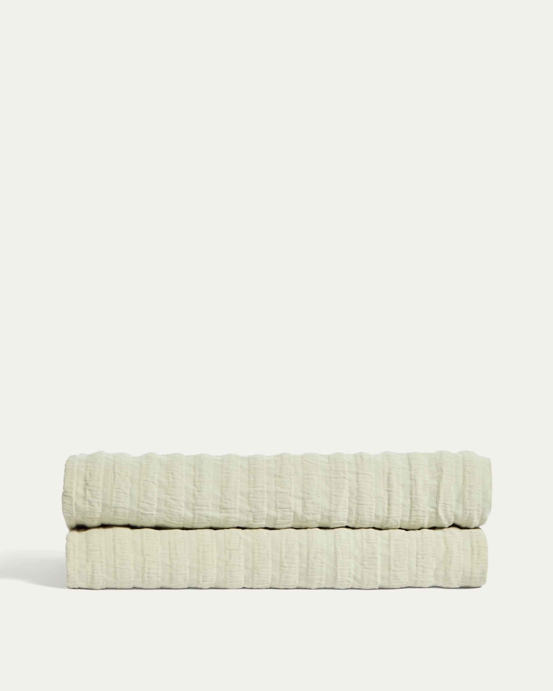 Rilune 100% cotton bedspread with light green embossed stripe effect for convertible cot - Product View