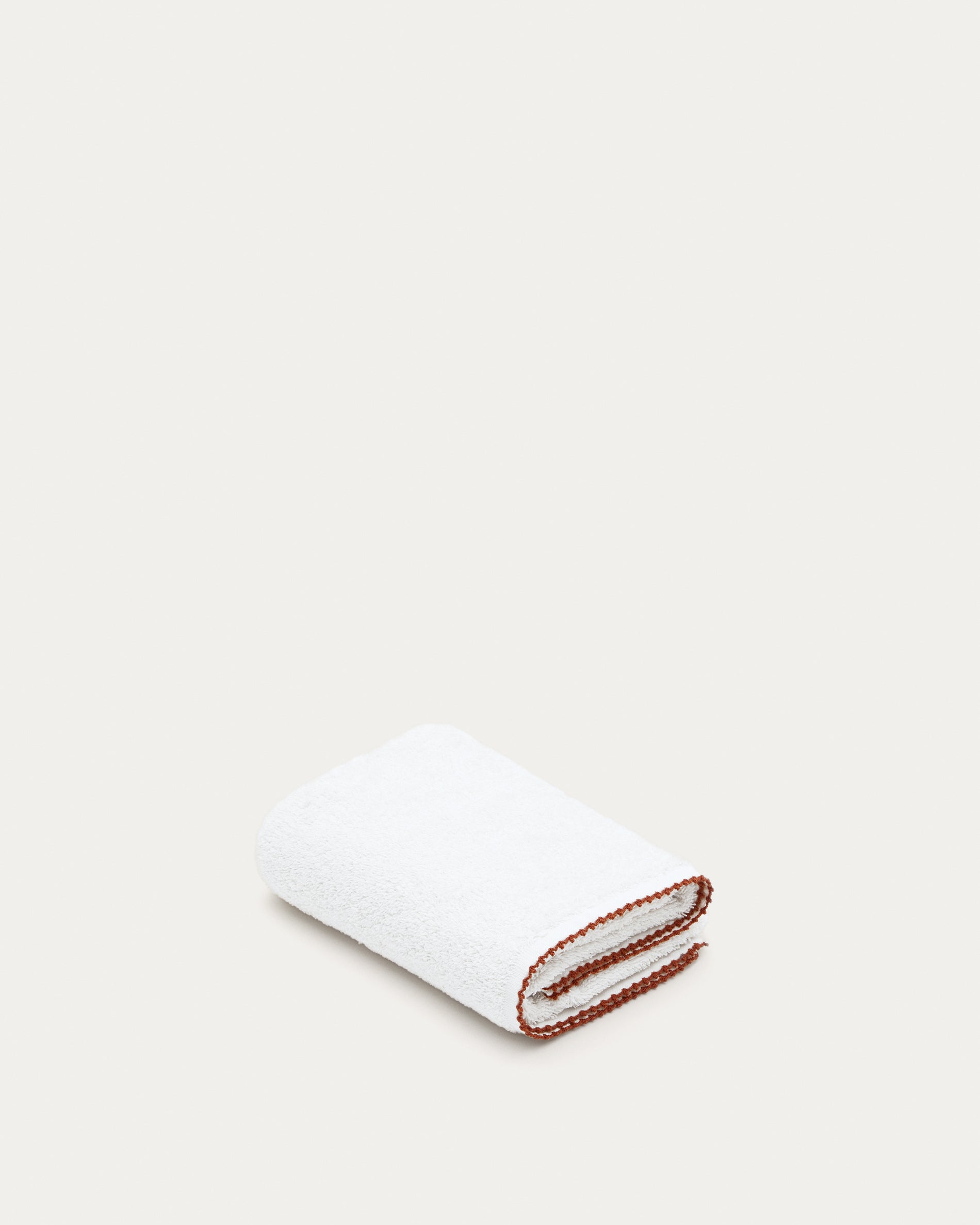 Sinami guest towel, 100% white cotton, contrasting terracotta details, 30 x 50 cm