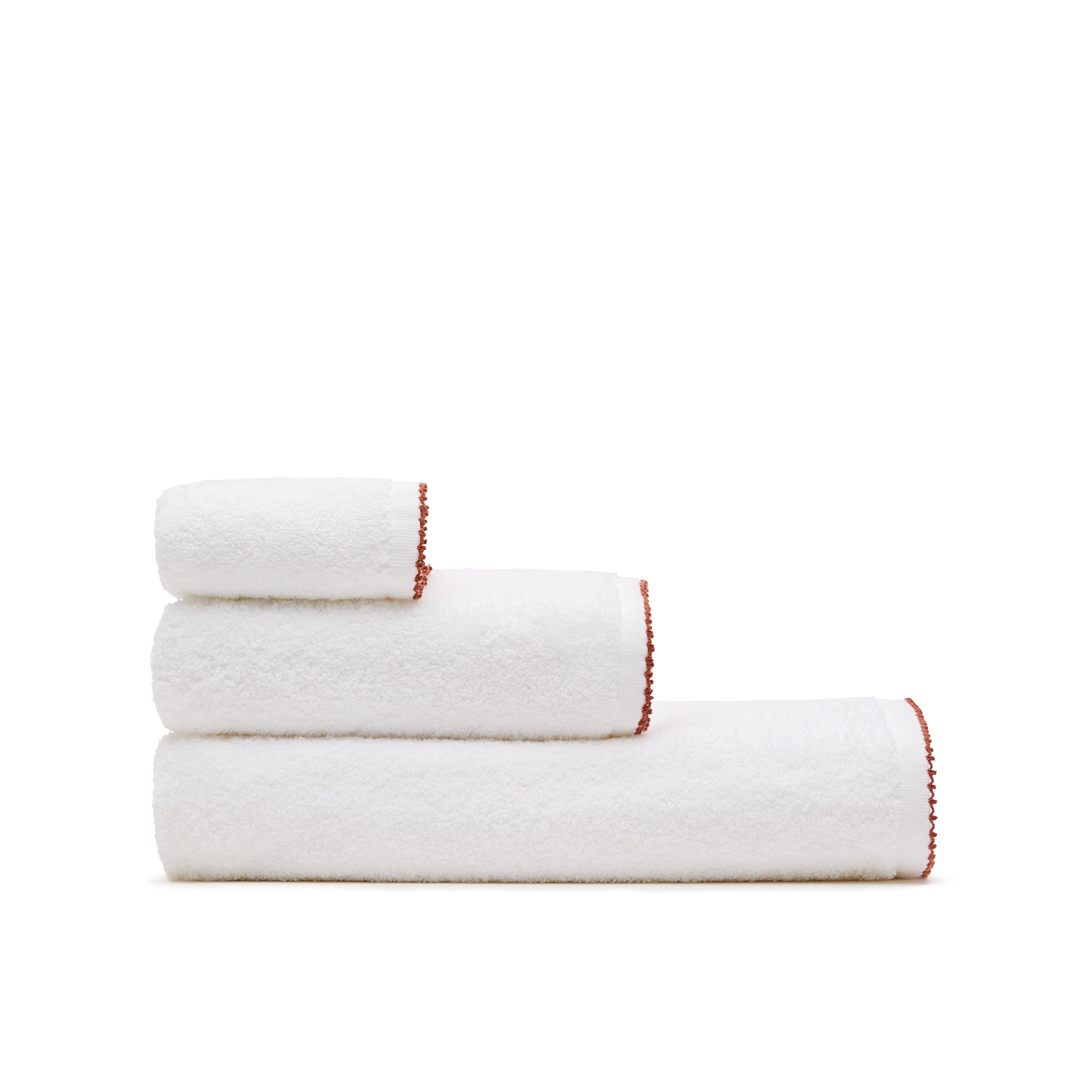 Sinami hand towel made of 100% white cotton with contrasting terracotta details 50 x 90 cm