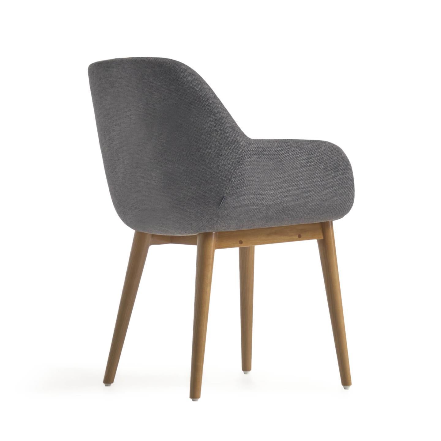 Konna chair in dark grey with solid ash wood legs in a dark finish